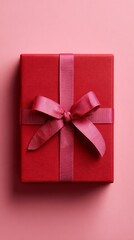 Red Gift Box with Ribbon on Pink Background