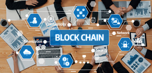 A dynamic team engages in a blockchain technology presentation, showcasing charts and innovative concepts in a modern office setting to foster collaboration and strategic thinking. Amity