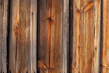 Natural wooden planks texture with visible grain and warm tones. Rustic wood background ideal for design, construction concepts and organic materials with copy space