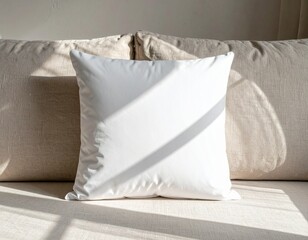 Clean White Pillow on a Cozy Sofa, Bathed in Natural Morning Light
