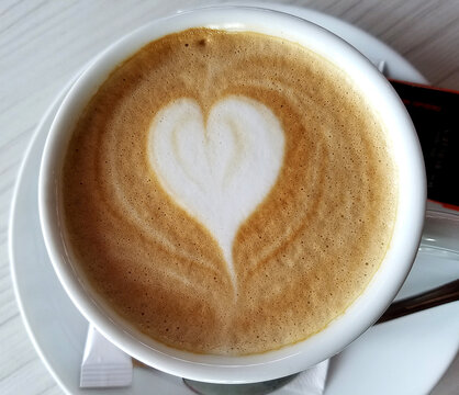 Cappuccino Coffee Cup with a Cinnamon Heart Froth