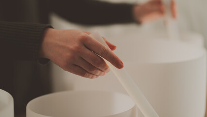 Crystal Singing Bowl hand Close-Up