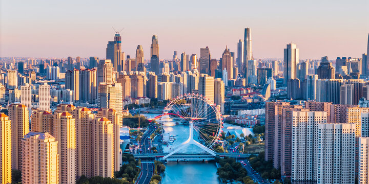 Aerial telephoto view of the skyline of Tianjin Eye Ferris Wheel on the Haihe River in Tianjin, China 