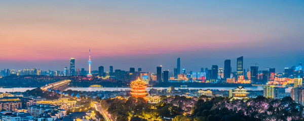 Night view of the Yellow Crane Tower, Yangtze River Bridge, and Hubei Military Governor's Mansion in Wuhan, Hubei Province, China