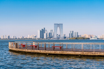 Skyline scenery of the boardwalk along Jinji Lake in Suzhou, Jiangsu Province, China © Govan