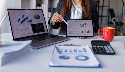 Business professional investor working new start up project. tablet laptop computer with digital marketing media in virtual icon design Finance managers meeting.
