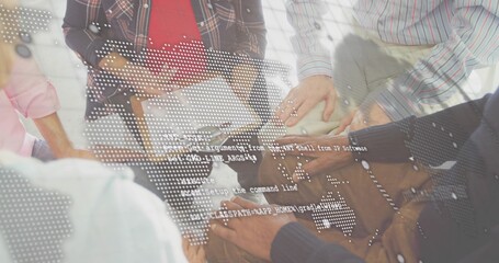 Joining team stacking hands at wooden table in office, plaid shirt, papers and digital overlay