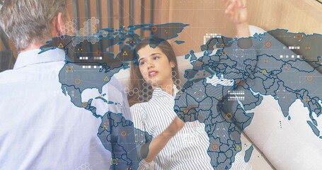 Speaking woman in striped top reclining on sofa, gesturing hand in living room, digital map overlay