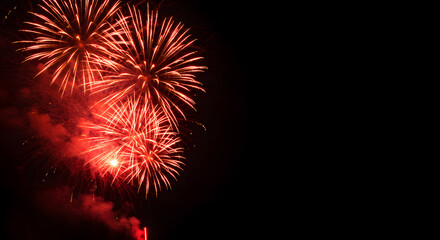 "A stunning display of red fireworks bursting in the night sky, creating vibrant sparks and golden smoke, ideal for celebration themes."