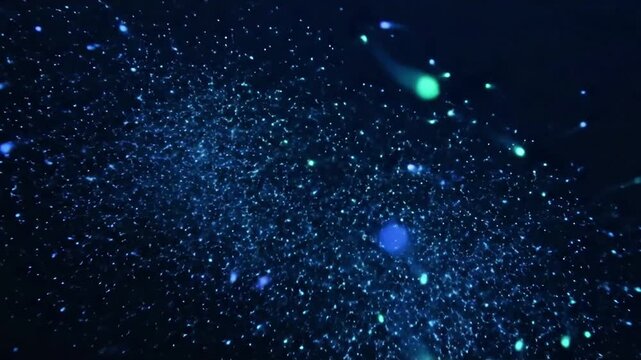 Macro Bioluminescence Spark Ultra-close-up of individual glowing plankton creating tiny, ephemeral sparks in dark, pristine water.