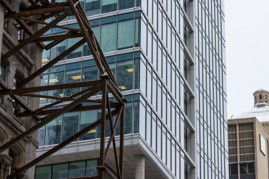 Canada, Montreal, 24 December 2025 : Modern architecture meets historical construction amid urban development coexistence
