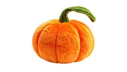 A plush, orange pumpkin with a green stem is isolated against a black background