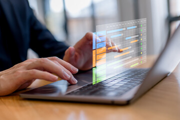 Project management, scheduling, workflow planning, data tracking, productivity analysis and modern business technology concept.Business professional using laptop with virtual project timeline and prog
