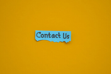 Contact us symbol. Sticky notes with words Contact us. Business and Contact us concept.