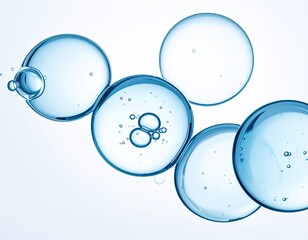 Floating, translucent blue bubbles on white background