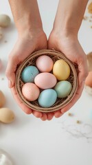 Hands holding decorated easter eggs