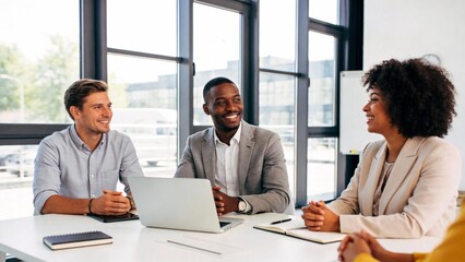 Three people in a business meeting