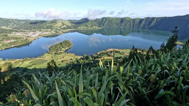 Aerial view of Lagoa das Sete Cidades, showing the Blue and Green Lakes divided by the bridge, Sao Miguel Island, Azores