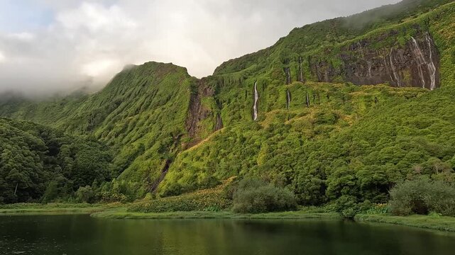 Multiple waterfalls at Poco da Ribeira do Ferreiro (Alagoinha) on Flores Island, Azores, Portugal