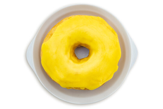 Donuts cubierta con glaseado amarillo