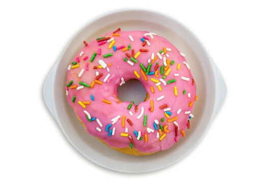 Donuts glaseado rosa y cubierta de chispas de colores