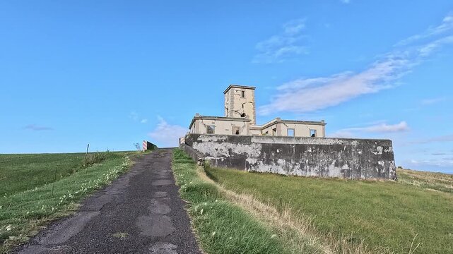 Ruins of Farol da Ribeirinha lighthouse on Faial Island, Azores, Portugal