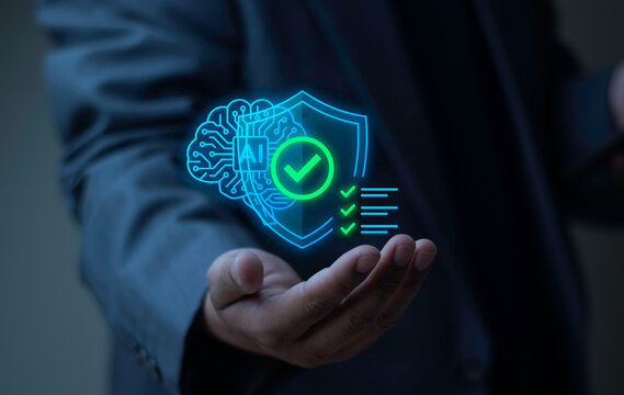 Businessman holding virtual AI brain protected by shield with green check mark. Concept of safe artificial intelligence, verified security, and regulatory compliance.