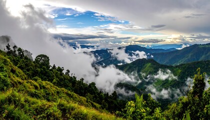 Obraz premium Majestic Mountain Vista - A Serene Landscape of Clouds and Peaks.