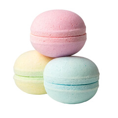 Colorful bath bombs stacked in a pyramid shape, pink, yellow, and blue hues visible