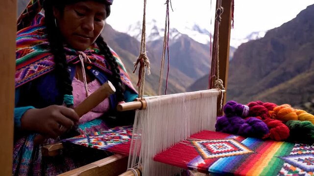 Indigenous woman weaving colorful traditional textiles high in the Andean mountains.