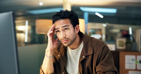 Man, night and headache at computer for business, workload pressure and mistake in article....
