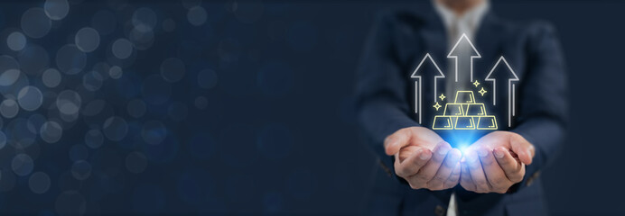 Gold Market Growth and Digital Investment.  Holding glowing gold bars and rising charts, representing gold market growth, digital investment, financial analysis and wealth expansion.