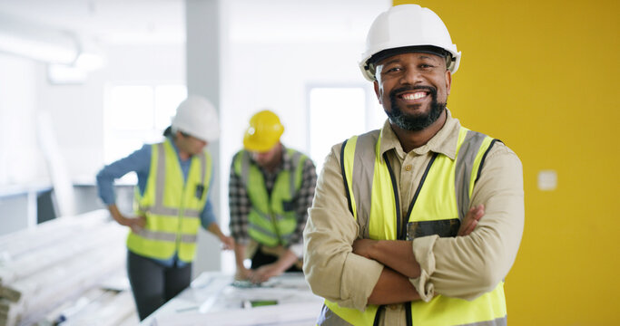 Portrait, confident or happy man with arms crossed, residential property development or maintenance. Pride, mature and African contractor with helmet for renovation, planning and building remodeling
