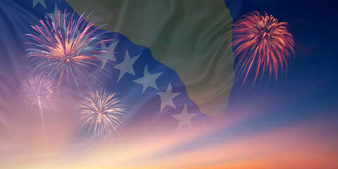 Waving National flags of Bosnia Herzegovina In sky with fireworks and text