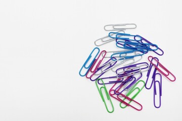Colorful paper clips white background