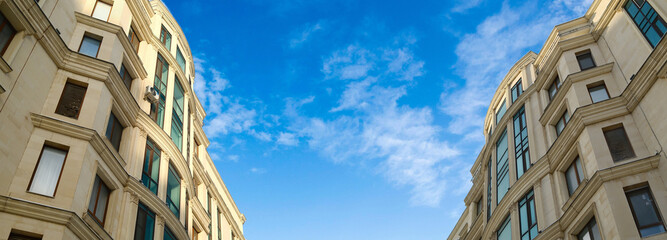 Classic European style apartment building facade with curved architecture