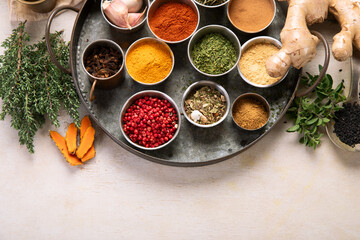 Different aromatic spices in bowls.