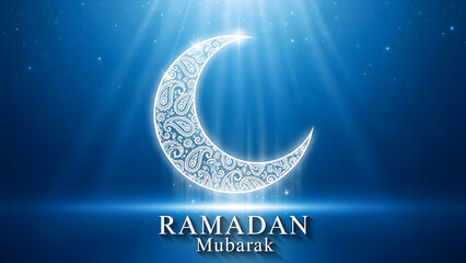 Beautiful glowing white crescent moon adorned with intricate paisley pattern illuminates a deep blue night sky wishing ramadan mubarak blessings