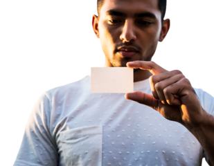 Serious young man with dark hair wearing a textured white collared shirt presenting a small blank business card, isolated on transparent background