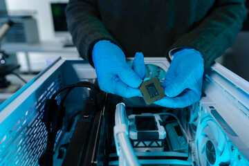 Hands repairing electronic devices. Electronic technician.