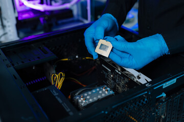 Hands repairing electronic devices. Electronic technician.