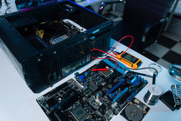 Hands repairing electronic devices. Electronic technician.