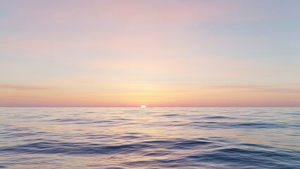 Fototapeta premium Ocean sunset with gentle waves pale sky sun just above horizon
