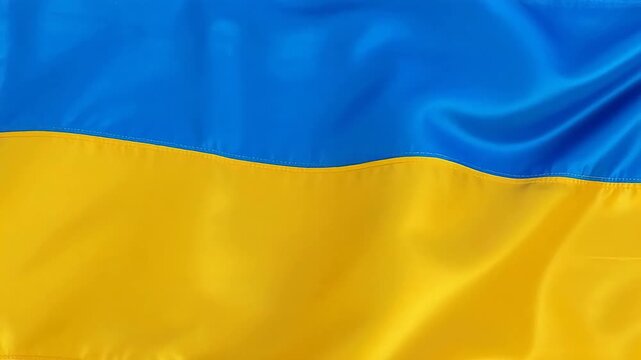 Closeup of a waving blue and yellow flag