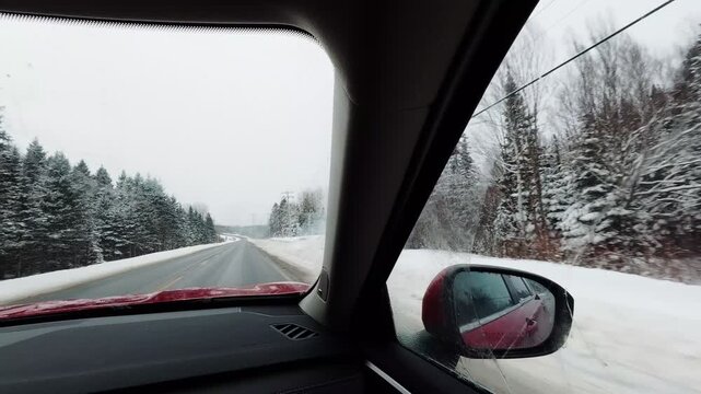 winter countryside driving scene through snowy canadian rural landscape