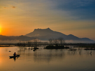 Morning at Khlong Hin Reservoir, with Khao Phanom Bencha as a backdrop, in Krabi province.