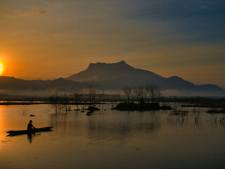 Morning at Khlong Hin Reservoir, with Khao Phanom Bencha as a backdrop, in Krabi province.