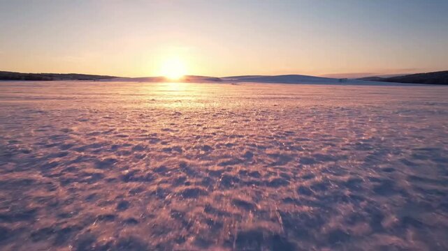 Subtle Wind Sparkle Static, eye-level shot capturing a pristine snow surface with a very subtle, almost imperceptible breeze causing the top layer of snow crystals to gently shimmer and flicker in