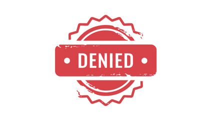 Obraz premium A red denied stamp on a white background with a distressed texture