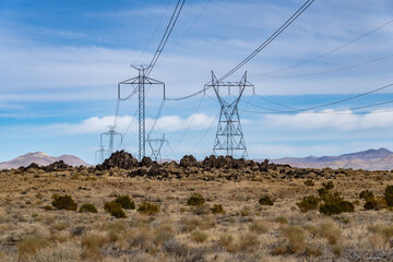 Trail to Little Lake Overlook, Coso Volcanic Field, Inyo County, California. Coso Range, Basin and Range Province. Volcanic rock, Basalt flows.  Overhead power line
